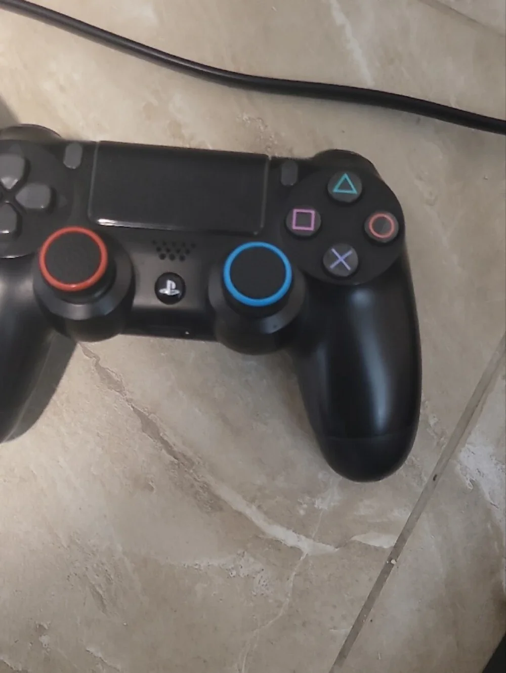 Sony Black PS4 Slim Console with Two Black DualShock Controllers